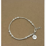 Be Still Pearl Curve Bar Bracelet
