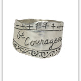 A sterling silver ring with the inscription 'BE COURAGEOUS' engraved on it. Joshua 1:9 Jewelry